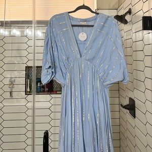 En Crème blue and gold dress